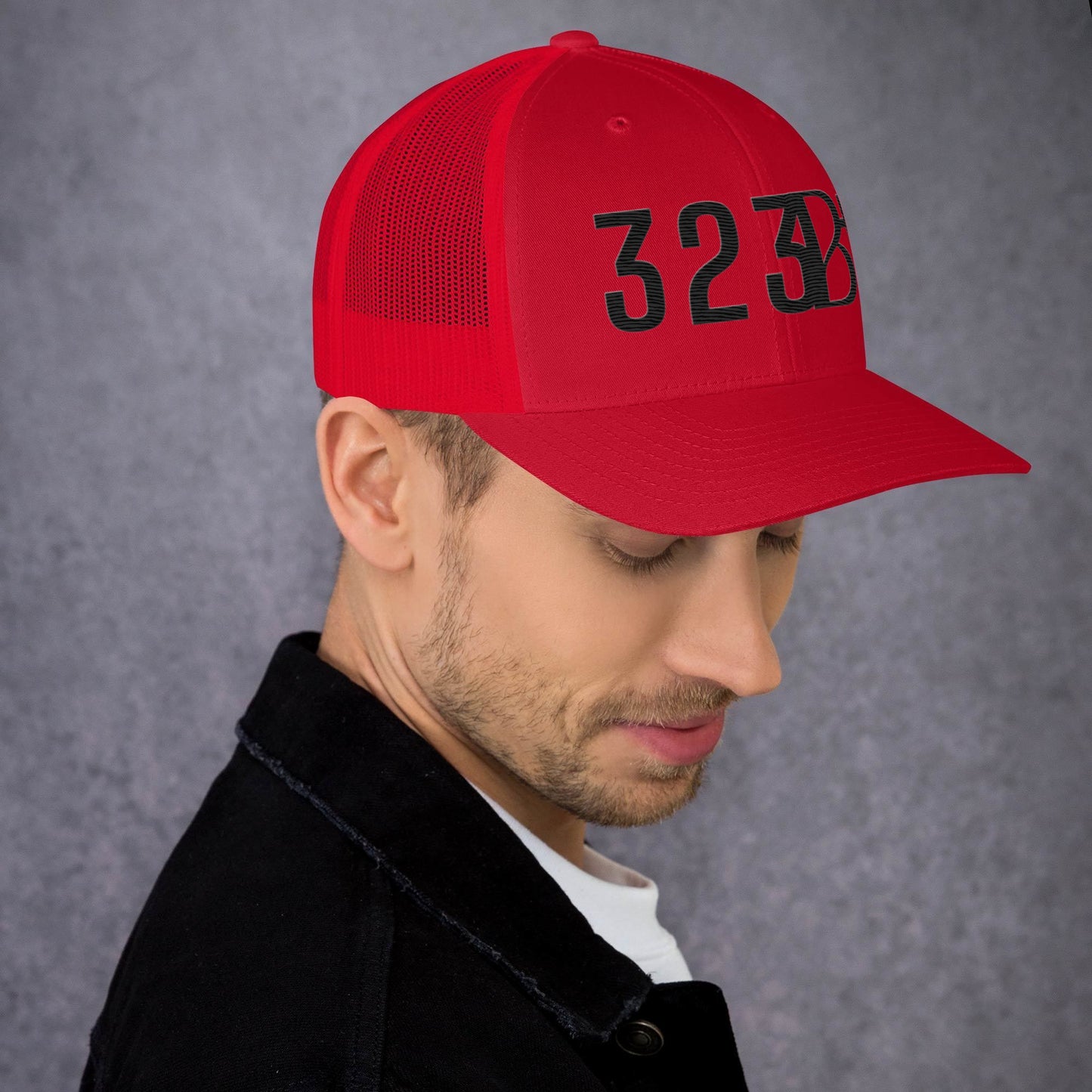 Black 323 STAMP Trucker Cap