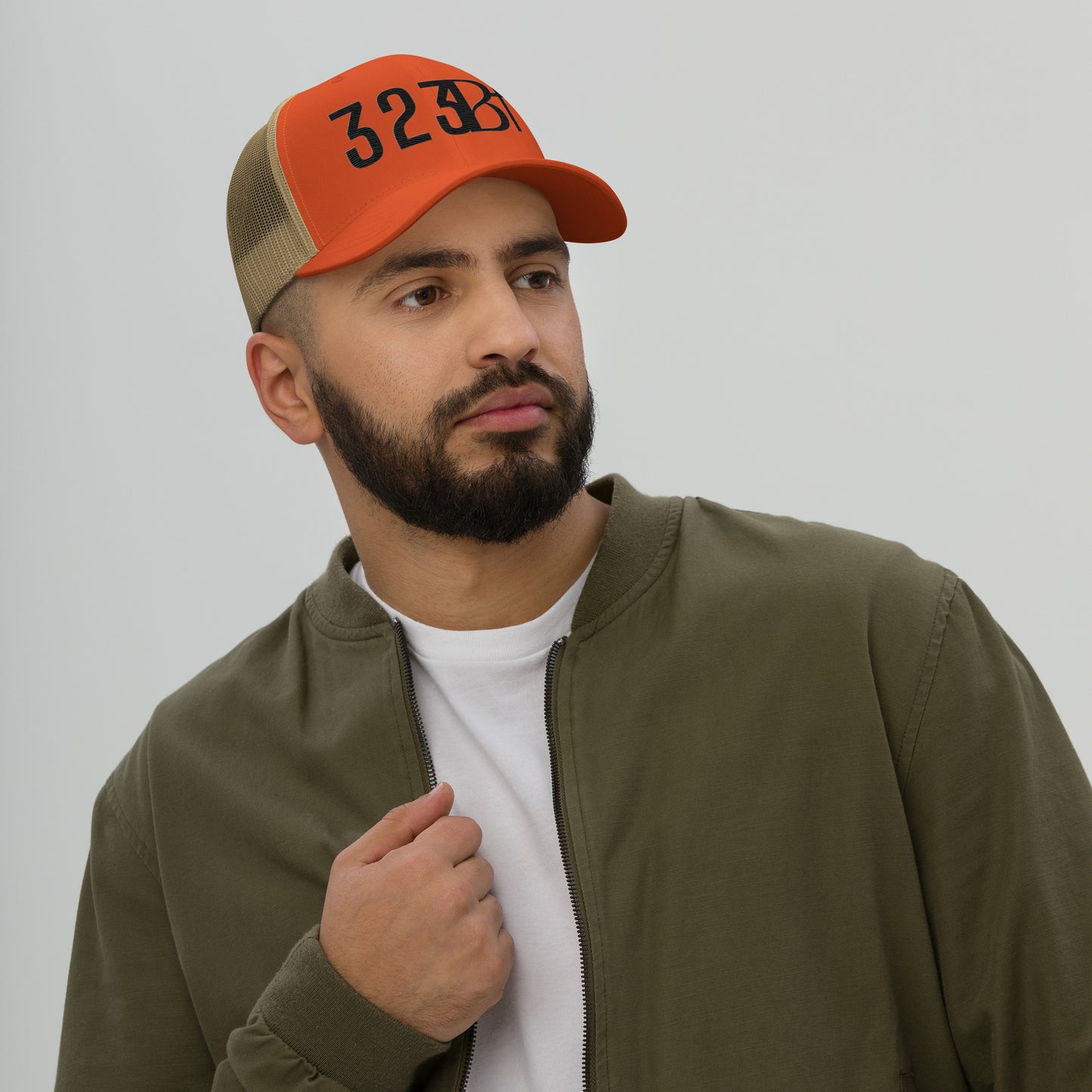 Black 323 STAMP Trucker Cap
