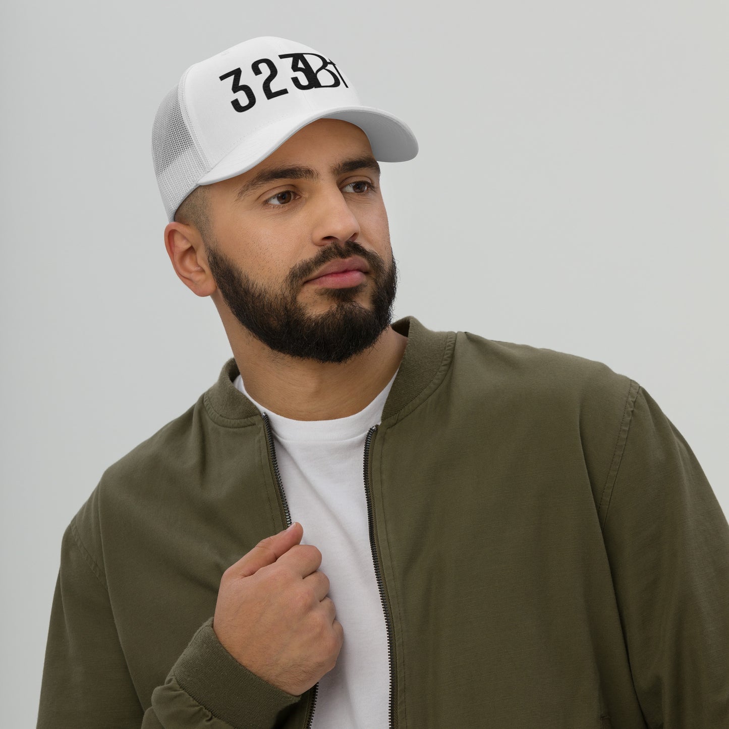 Black 323 STAMP Trucker Cap